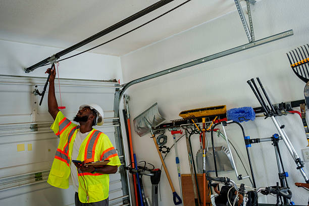 Professional Garage Door Panel Replacement technician working in Caddo, OK